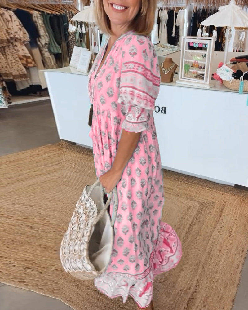 Verona | Tyylikäs mekko V-muotoisella kaula-aukolla ja hienovaraisella kuviolla